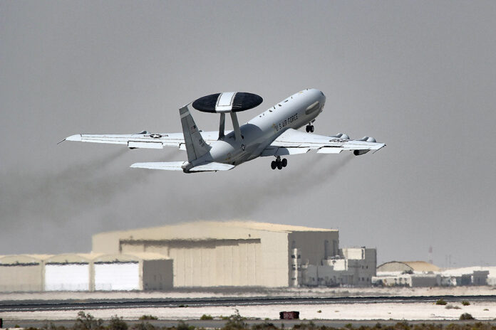 An Air Force E-3 Sentry takes off from Al Dhafra Air Base, United Arab Emirates, March 6, 2022. The E-3 is an airborne warning and control system aircraft with an integrated command and control battle management surveillance, target detection and tracking platform. (Air Force Master Sgt. Dan Heaton)