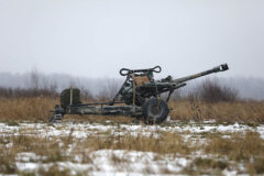 An M119A3 howitzer sits in a field, November 19, 2019, at Fort Drum, New York. As part of a new security assistance package announce April 21, 2022, the U.S. will send 72 howitzers and 144,000 artillery rounds to Ukraine. (Army Staff Sgt. Paige Behringer)