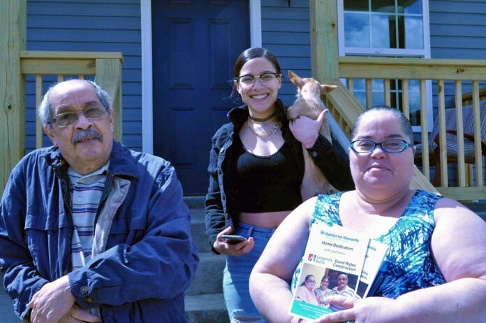 (L to R): Bartolo Figueroa, Alondra Figueroa, and Maria Padro Santana now own a Habitat for Humanity home.