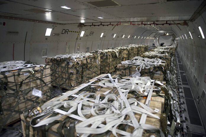 Pallets of ammunition, weapons and other equipment bound for Ukraine. (Air Force Tech. Sgt. J.D. Strong II)