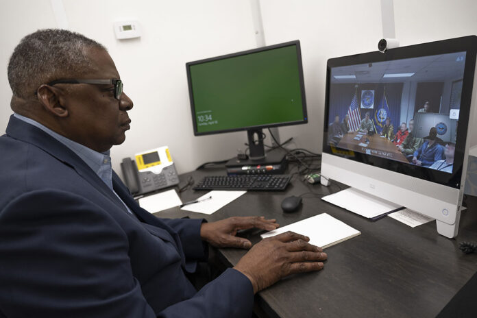 Secretary of Defense Lloyd J. Austin III speaks with Ukrainian forces via video teleconference participating in a pre-scheduled professional military education program, April 10, 2022. These Ukrainian forces were in the U.S. when Russia's invasion of Ukraine began on February 24. These troops are now returning to Ukraine to help defend their country. Secretary Austin thanked these troops for their service and for their courage, noting the skill with which the Ukrainian Armed Forces are fighting Russia's unprovoked invasion. (Chad J. McNeeley, DOD)