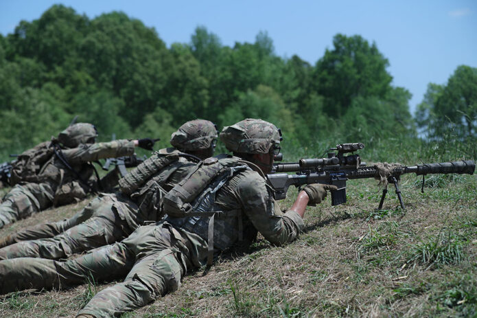 Spc. Hazen Machia of Charlie Troop, 1st Squadron, 32d Cavalry Regiment, 1st Brigade Combat Team, 101st Airborne Division (Air Assault) providing suppressing fire during a Live Fire Gunnery during Operation Lethal Eagle II at Fort Campbell, Ky on Tuesday, May 10th, 2022. (Spc. Jordy Harris, 101st Airborne Division (Air Assault))