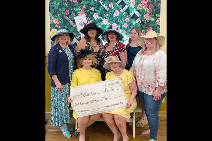 (L to R standing) Clarksville Women's Club President Patty Gabilondo, VP Deanna Shepard, Secretary Angie Comfort, Treasurer Heather Haun, Parliamentarian Misty Roberton. (Seated) First Lady of Clarksville and Co-Founder of Bella's Closet Cynthia Pitts and Co-Founder of Bella's Closet Carolyn Watson.