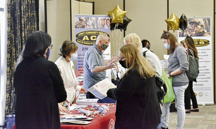 oldiers and Families learn about a variety of deployment-related services offered on the installation March 2nd during a deployment readiness fair at Army Community Service. The event brought together representatives from 20 on-post agencies who provided briefings as well as information about resources available to Soldiers and their Families before, during and after a deployment. (Ethan Steinquest, Fort Campbell Courier)