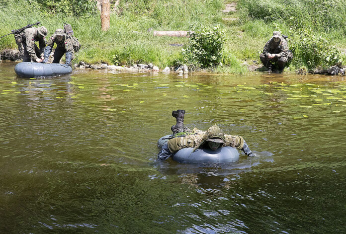 American and Polish troops of the Bemowo Piskie Training Area, Poland conduct a wet gap crossing training, June 9, 2022. (Army Staff Sgt. Walter Carroll)