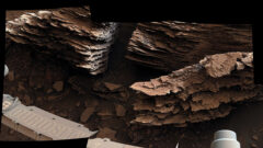NASA’s Curiosity Mars rover captured this view of layered, flaky rocks believed to have formed in an ancient streambed or small pond. The six images that make up this mosaic were captured using Curiosity’s Mast Camera, or Mastcam, on June 2, 2022, the 3,492nd Martian day, or sol, of the mission. (NASA/JPL-Caltech/MSSS)