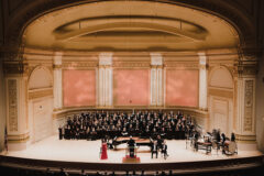 Austin Peay State University’s Dr. Penelope Shumate, in red, performs on June 6th at Carnegie Hall. (Photo courtesy of DCINY Production Photography)