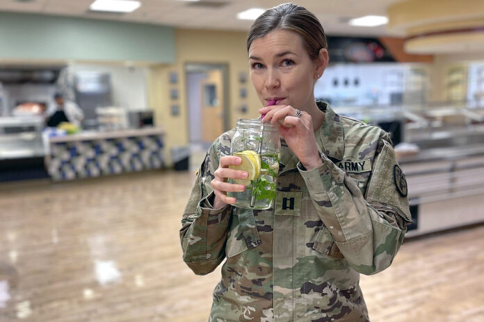 U.S. Army Capt. Caitlyn Shaver, chief of Clinical Nutrition at Blanchfield Army Community Hospital, Fort Campbell, Kentucky drinks water throughout the day to help maintain optimal hydration. Despite the variety of consequences dehydration has, it can be all too easy to forget to drink enough water. (Maria Christina Yager, Blanchfield Army Community Hospital)