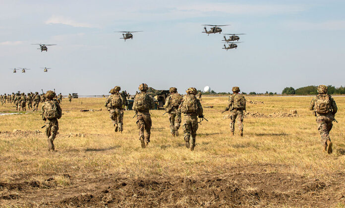 Soldiers assigned to the 2nd Brigade Combat Team, 101st Airborne Division (Air Assault) and UH-60 Blackhawks and CH-47 Chinooks assigned to the 2nd and 3rd Battalion, 227th Aviation Regiment, 1st Air Cavalry Brigade, 1st Air Cavalry Division, conduct an Air Assault demonstration on July 30th, 2022, at Mihail Kogalniceanu, Romania. 101st units will support V Corps mission to reinforce NATO’s eastern flank and engage in multinational exercises with partners across the European continent to reassure our Nations allies. (Staff Sgt. Malcolm Cohens-Ashley, 40th Public Affairs Detachment)