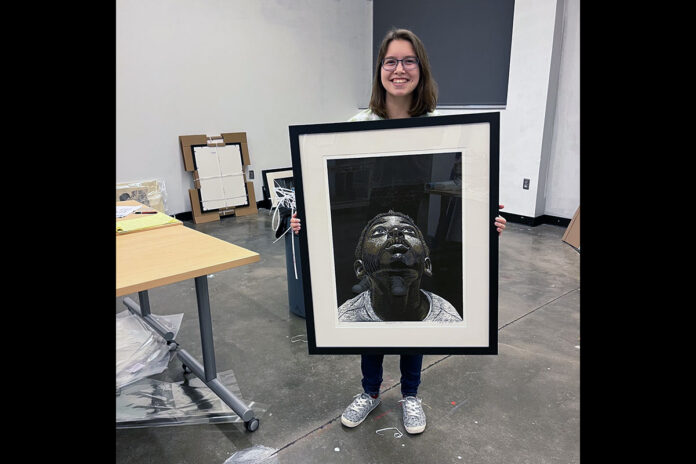 Over the summer, Austin Peay State University student Rheanne Bouchard got hands-on experience documenting, researching and handling works of art in the university’s art collection. (APSU)
