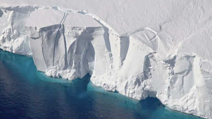 The 200-foot-tall (60-meter-tall) front of the Getz Ice Shelf in Antarctica is scored with cracks where icebergs are likely to break off, or calve, in this 2016 photo. The first estimate of Antarctic calving has found that since 1997 ice shelves have lost as much ice from calving as from melting. (NASA/GSFC/OIB)