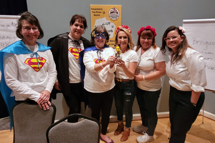 The Super Spellers (left) and the ‘Real’ Bees (right) were crowned co-champions at Imagination Library’s Grown-Up Spelling Bee fundraiser on September 27th, 2022.