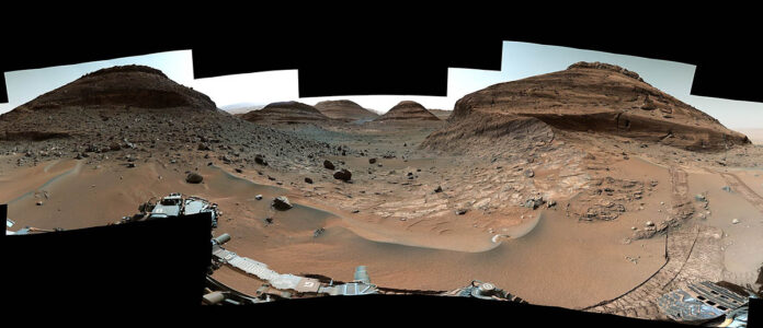 NASA’s Curiosity Mars rover used its Mast Camera, or Mastcam, to capture this panorama while driving toward the center of this scene, an area that forms the narrow “Paraitepuy Pass” on August 14th, the 3,563rd Martian day, or sol, of the mission. (NASA/JPL-Caltech/MSSS)