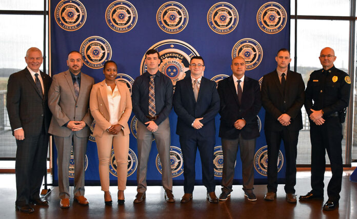 {L-R) Clarskville Mayor Joe Pitts, Manpreet Singh, Ariel Walls, Jeffery Ohmes, Martin Musser, Sergio Lucas, John Lilley, and Clarksville Police Chief David Crockarell