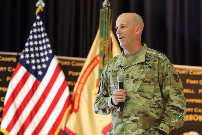 Command Sergeant Major Joseph G. Harbour, Fort Campbell garrison command sergeant major, reflects on his career and service as garrison senior enlisted adviser during a Workforce Town Hall, November 1st at Wilson Theater. (Ethan Steinquest, Fort Campbell Courier)