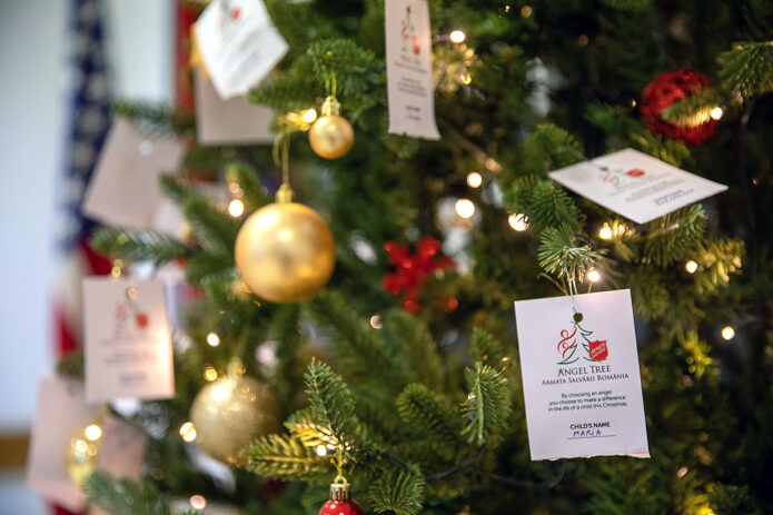 A Christmas tree with the names of Romania children, and what they want for the holidays, as part of the Angel Tree project at Mihail Kog?lniceanu Air base in Romania, Dec. 22, 2022. (Sgt. Nicholas Goodman, 101st Airborne Division)