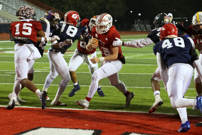 East All-Stars #18 Kade Hewitt runs in from 1 yard out for a touchdown Friday night at Fortera Stadium during the Tennessee East-West All-Star Classic. (Mark Haynes, Clarksville Online)