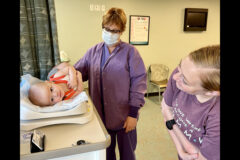 Mom & Me participant, Pfc. Jacqueline Kerchner smiles at her son, while Registered Nurse, Lesli Eiland, a certified lactation consultant, gets his post-feeding weight during Blanchfield Army Community Hospital’s breastfeeding support group, July 11. Lactation support is a maternal care service at Blanchfield available to help patients reach their breastfeeding or lactation goals. (Maria Yager, Department of Defense)