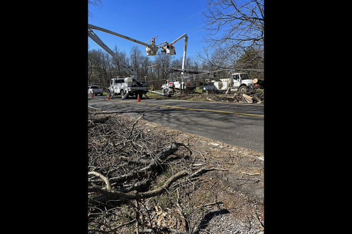 CEMC crews continue the work to restore power. (CEMC)
