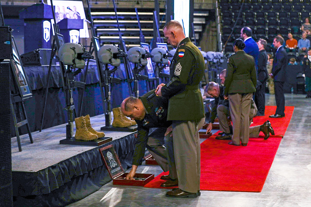 Gen. Andrew Poppas, commanding general of United States Army Forces Command, and Command Sgt. Maj. Todd Sims, command sergeant major for FORSCOM, pay respects during a memorial ceremony April 13, 2023, in Clarksville, Tenn. The ceremony was held to honor the nine Soldiers from Charlie Company, 6th Battalion, 101st Combat Aviation Brigade, 101st Airborne Division (Air Assault), killed in a helicopter accident March 29, 2023. (Sgt. Andrea Notter, 101st Airborne Division) Gen. Andrew Poppas, commanding general of United States Army Forces Command, and Command Sgt. Maj. Todd Sims, command sergeant major for FORSCOM, pay respects during a memorial ceremony April 13, 2023, in Clarksville, Tenn. The ceremony was held to honor the nine Soldiers from Charlie Company, 6th Battalion, 101st Combat Aviation Brigade, 101st Airborne Division (Air Assault), killed in a helicopter accident March 29, 2023. (Sgt. Andrea Notter, 101st Airborne Division)