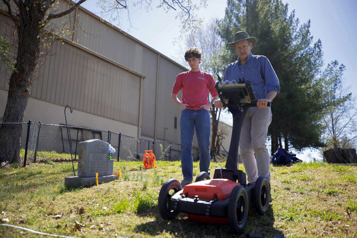 Dr. Daniel Frederick operates a Ground Penetrating Radar (GPR) at Riverview Cemetery. (APSU)