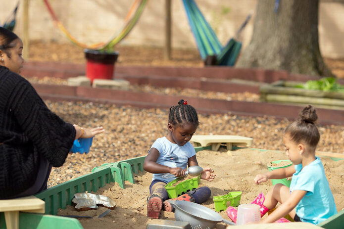 Areas like the sandbox at Little Govs Child Learning Center were designed with plenty of loose materials to encourage children to explore. (APSU)