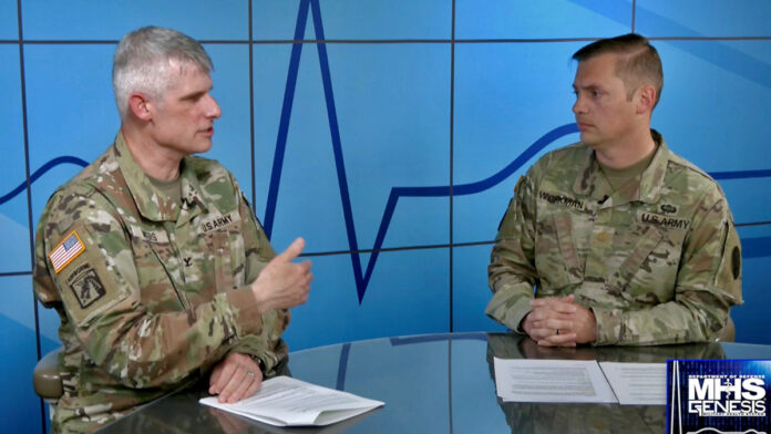 Col. Vincent B. Myers, commander of Blanchfield Army Community Hospital and director of the Defense Health Agency’s Southwest Kentucky Market speaks with Maj. Mark Workman, chief of Blanchfield’s Clinical Support Division during a virtual Facebook Town Hall aired May 6 discussing the hospital’s transition to the Defense Departments new electronic health record, MHS GENESIS. More than 100,000 military and civilian TRICARE eligible beneficiaries living on and around Fort Campbell will transition to the new electronic health record platform, June 3rd. (BACH)