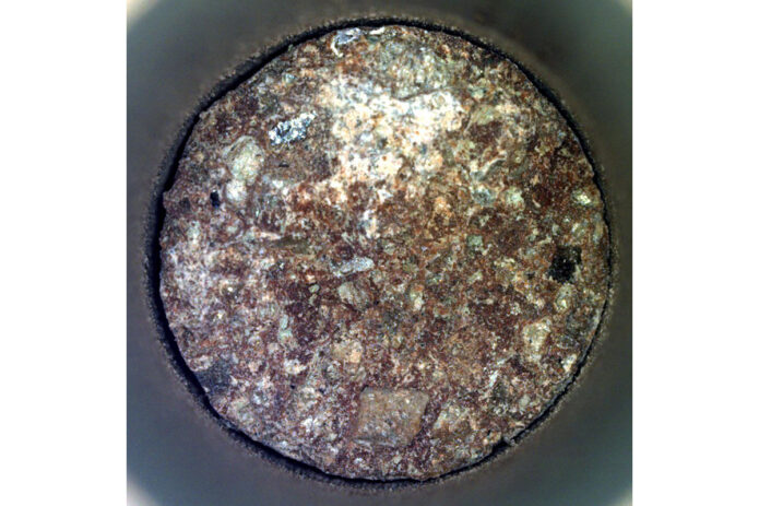 NASA’s Perseverance captured this image June 13 of a sample it cored from a conglomerate rock called “Emerald Lake.” This “Otis Peak” core shows distinctly colored areas that are individual minerals transported by a river that once flowed into Jezero Crater. (NASA/JPL-Caltech)