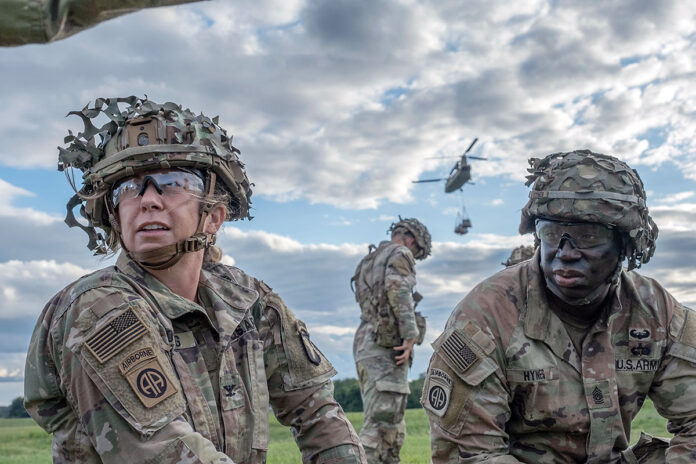 Col. Amy Downing and Command Sgt. Maj. Arthur Hynes with the 101st Division Sustainment Brigade command team during Operation Lethal Eagle III at Fort Campbell. {Sgt. Kaden D. Pitt, 101st Division Sustainment Brigade Public Affairs)