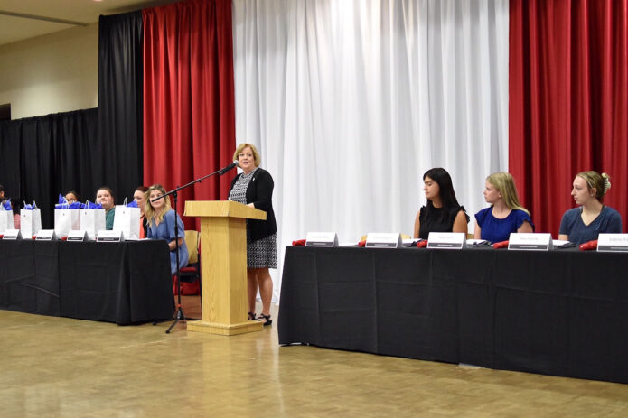 Dr. Lisa Barron, Austin Peay State University Eriksson College of Education associate dean and director of teacher education and partnerships, speaks during the rural cohort teacher residency signing event. (APSU) 