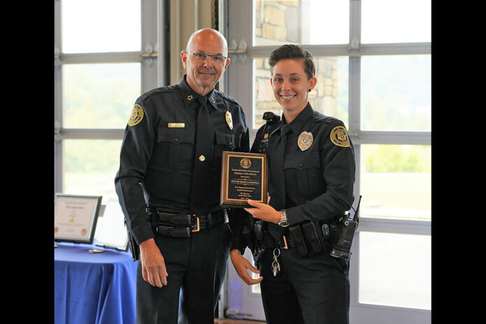 Clarksville Police Chief David Crockarell and Officer Isabella Hofinga.