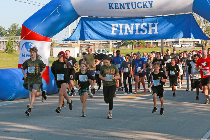 Soldiers of the 101st Airborne Division (Air Assault), along with family and friends of the fallen, begin the Run for the Fallen on Fort Campbell, KY, September 23rd, 2023. The Run for the Fallen is a community event held in remembrance of fallen Soldiers of the 101st. (Spc. Jayden Woods, 40th PAD)