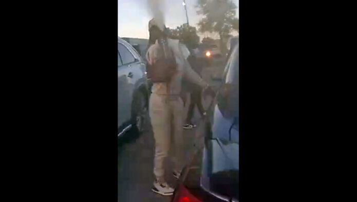 Daniell Pitt spraying bear spray