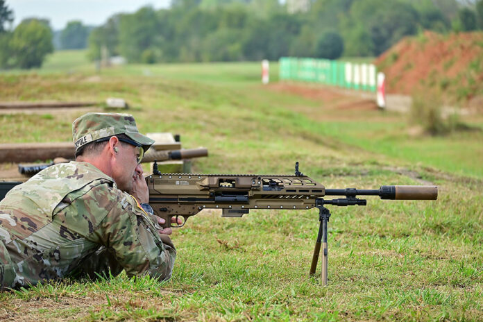 U.S. Army Fort Campbell Command Sgt. Maj. Chad Stackpole fires a Next-Generation Squad Weapon (NGSW) Machine Gun during a weapon familiarization demonstration, Sept. 25, 2023, at Fort Campbell, Ky. Both the XM7 Rifle and the XM250 Automatic Rifle are primed to replace their predecessors, the 5.56mm caliber M4s and M249 SAWs, and introduce a slew of advancements in military firepower. (Kayla Cosby)