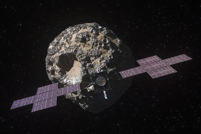 This illustration depicts NASA's Psyche spacecraft as it approaches the asteroid Psyche. Once it arrives in 2029, the spacecraft will orbit the metal-rich asteroid for 26 months while it conducts its science investigation. (NASA/JPL-Caltech/ASU)