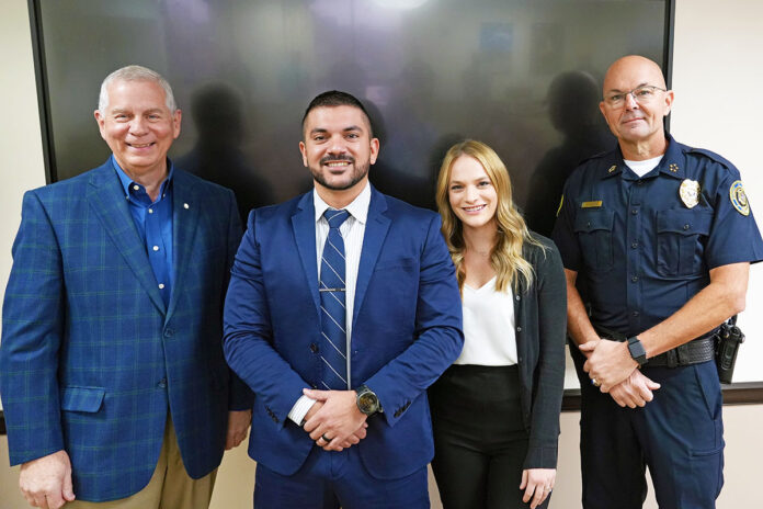 (L to R) Clarksville Mayor Joe Pitts, David Diaz, Shelby Diaz (wife), and Clarksville Police Chief David Crockarell.