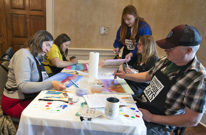 Austin Peay State University alumna Sarah Spillers leads a free painting workshop at the Customs House. (Customs House Museum & Cultural Center)