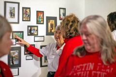 Dr. Becky Glass discusses the meaning behind her photography with community members at the Trahern Building during an exhibition hosted on February 2nd (Jaylon Gonzales, APSU Student)