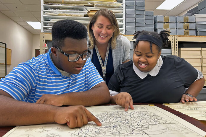 Austin Peay State University history students research census records at the Montgomery County Archives. (APSU)
