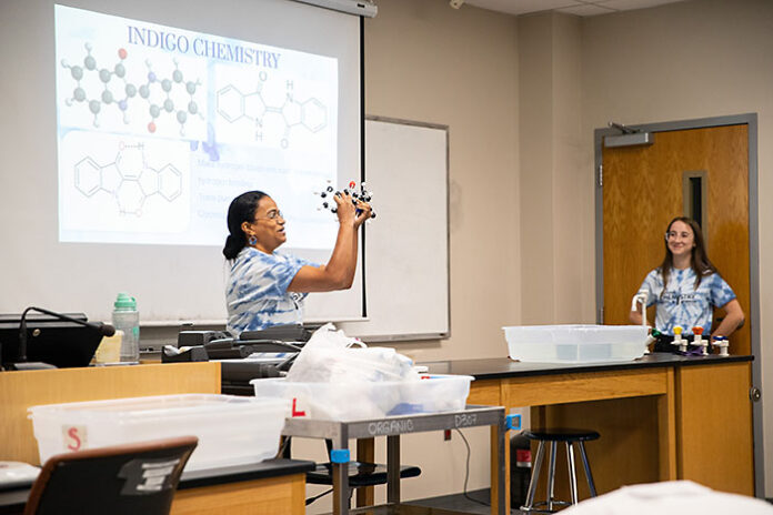 Dr. Anuradha Pathriranage gives a chemistry demonstration. (APSU)