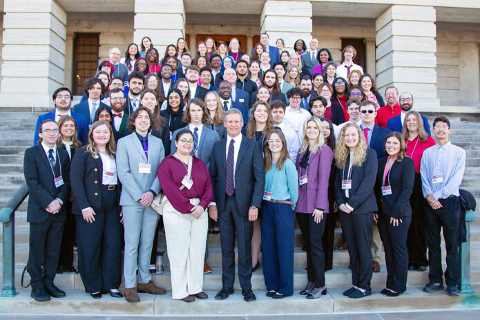 Tennessee Governor Bill Lee takes a group picture with student researchers, including eight from Ausitn Peay State University, on February 14th during Posters at the Capitol. (Colby Wilson)
