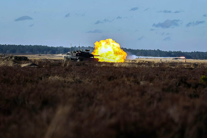 Soldiers in an M1A2 SEPV3 Abrams tank assigned to the U.S. Army's 3rd Infantry Division fires conduct a Combined Arms Live-Fire exercise at Trzebien, Poland, February 12th, 2024. The 3rd Infantry Division’s mission in Europe is to engage in multinational training and exercises across the continent, working alongside NATO Allies and regional security partners to provide combat-credible forces to V Corps, America’s forward deployed corps in Europe. (Spc. Bernabe Lopez III, U.S. Army)