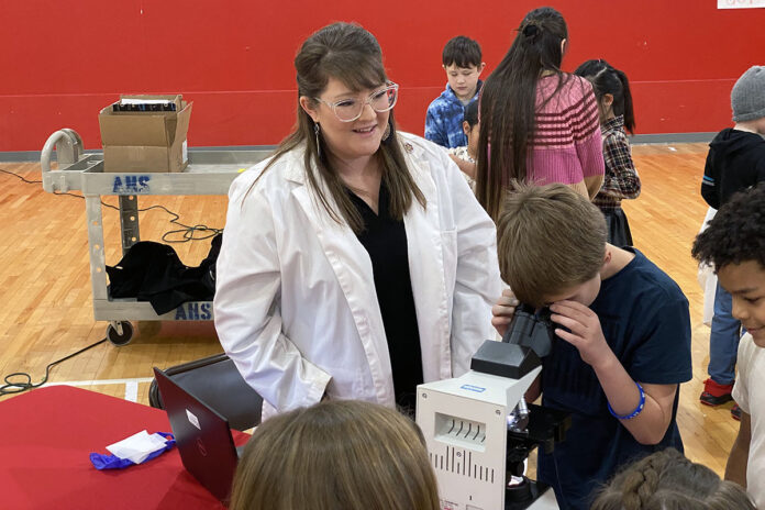 Dr. Heather Phillips, Austin Peay State University’s director of laboratory testing and assistant professor of medical laboratory science (MLS), gives a demonstration of the field for local students. (APSU)
