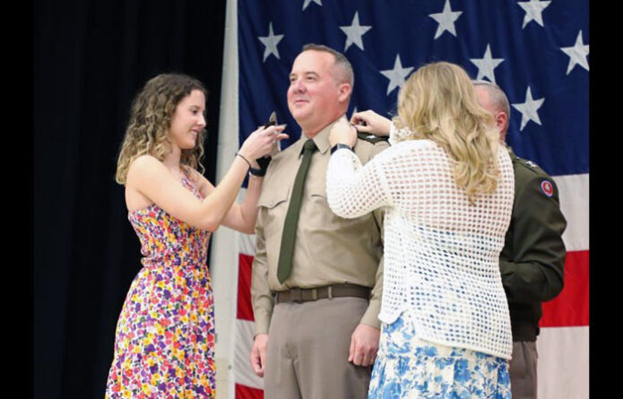 Tennessee’s Assistant Adjutant General-Army, Steven Turner, is promoted to the rank of brigadier general and is having his new rank pinned on by his daughters, Mollie and Anna, during a ceremony at the Tennessee National Guard’s Joint Forces Headquarters in Nashville, March 3rd. (Lt. Col. Darrin Haas)
