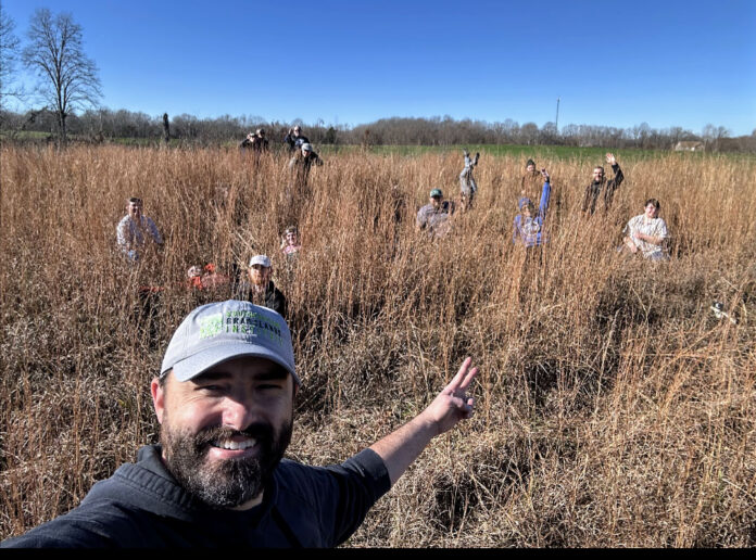 Dr. Dwayne Estes, executive director of the Southeastern Grasslands Institute and professor of biology at Austin Peay State University, works in the field with his students. (APSU)