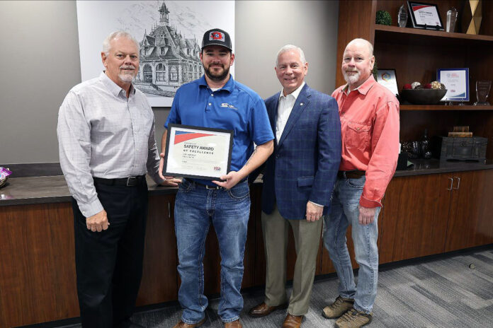 (L-R) Brian Taylor, General Manager for CDE Lightband; Jeremy Wood, Safety Manager for CDE Lightband; Clarksville Mayor Joe Pitts; Garnett Ladd, Power Board President for CDE Lightband.