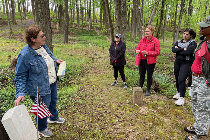 Phyllis Smith, the historian for the Mt. Olive Cemetery Historical Preservation Society, leads a tour for public health professionals from Austin Peay State University and the surrounding community (Ethan Steinquest, APSU)