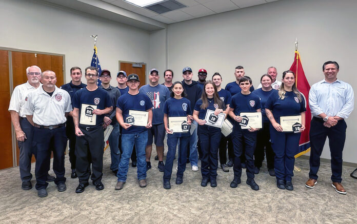 (Back row left to right) Chief Ed Baggett, Training Officer Logan Face, Kevin LeBaron, Austin Lehmann, Patrick Shay, Doyle Vandament, Hunter Goodfellow, Albert Cabell, Rocco Santarsiera, Jack Whittaker, and Training Officer Kevin Falsetto. (Front row left to right) Deputy Chief Randy Steeley, David Moulton, Will Johnson, Jelissa Mandujano, Lilli Cobb, Nolan Brown, Jorja Forsberg, Sarah Morais, Montgomery County Mayor Wes Golden. (Not pictured) William Frisin, Jeffrey Louissaint, and Riley Drake.