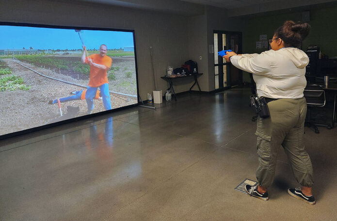 Criminal Justice: Correctional Officer student, Zaria Heinrich, practices verbal de-escalation tactics and when to deploy a taser on a simulation in her classroom on TCAT Dickson’s Clarksville extension campus. 