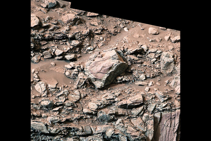 While exploring Gediz Vallis channel in May, NASA’s Curiosity captured this image of rocks that show a pale color near their edges. These rings, also called halos, resemble markings seen on Earth when groundwater leaks into rocks along fractures, causing chemical reactions that change the color. (NASA/JPL-Caltech/MSSS)